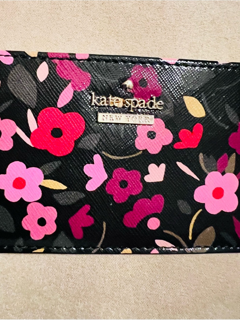 kate spade black floral cardholder with pink & red blooms